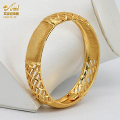 Designer African Bracelet: 24K Gold-Colored Bangles for Women, Luxury Wedding Jewelry - Flexi Africa - Flexi Africa offers Free Delivery Worldwide - Vibrant African traditional clothing showcasing bold prints and intricate designs