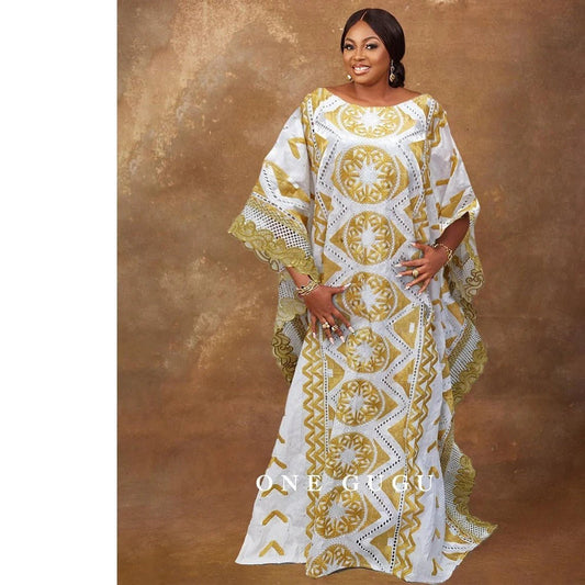 Radiate Elegance in our Nigerian Bazin Dress - Gold Brocade Embroidery and White Robe Design Perfect for Weddings & Parties - Free Delivery Worldwide only at Flexi Africa